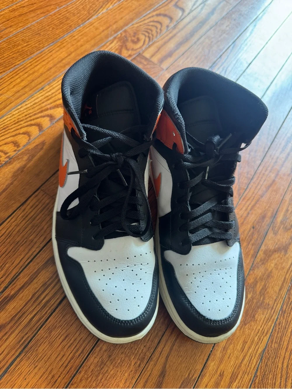 Black White and Orange High-Top Jordan 1